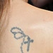 Alyssa Milano Tatouage Dos